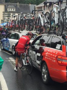 Richie Porte locked in conversation with the team car